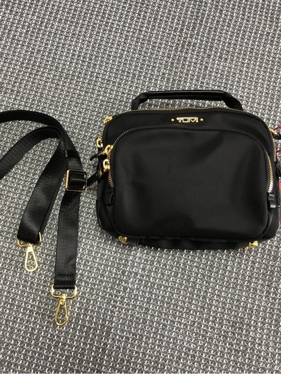 Tumi Handbags - Tumi Black Nylon Crossbody Bag with Gold Hardware